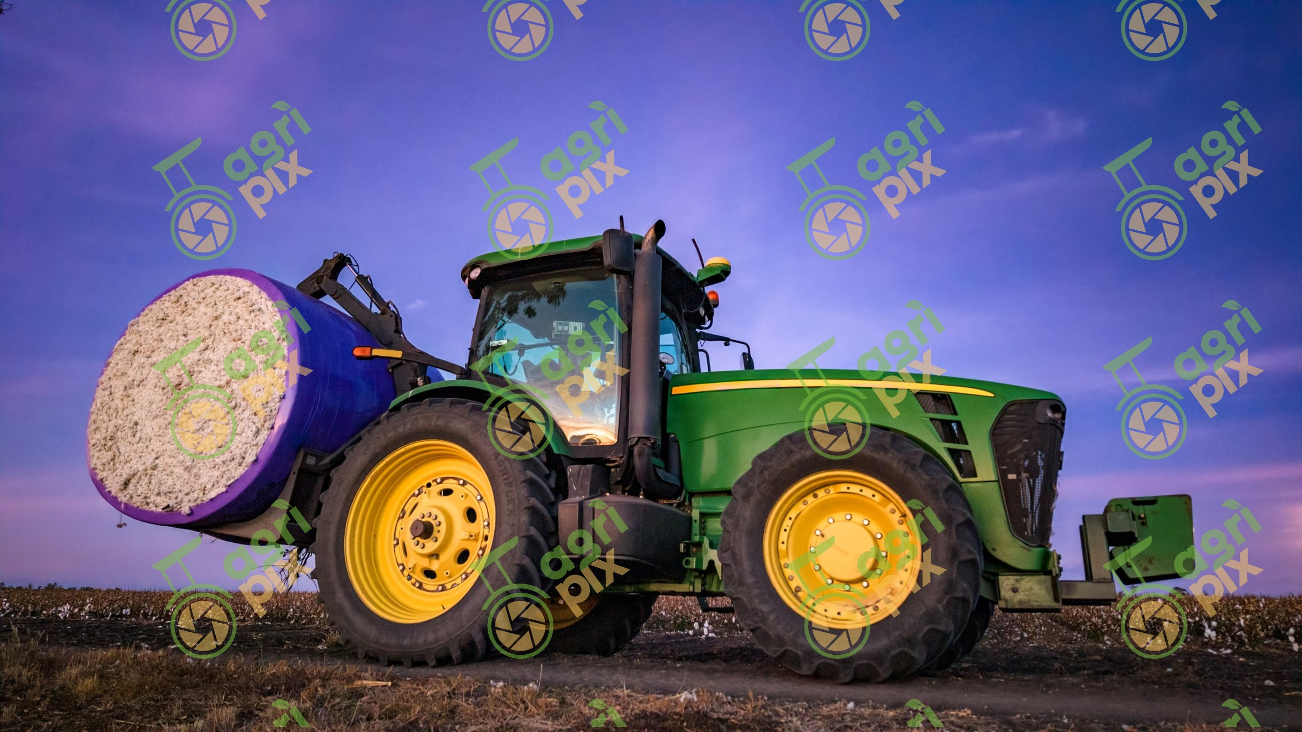 tractor with cotton bale